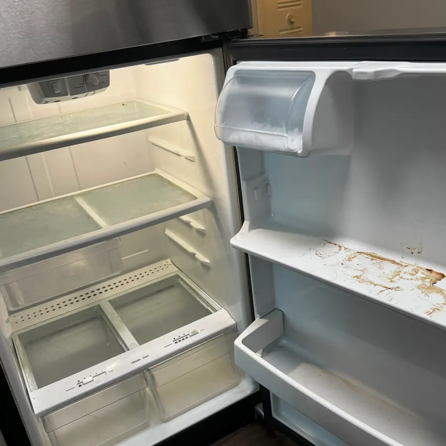 the inside of a refrigerator, before a Brio Cleaning visit